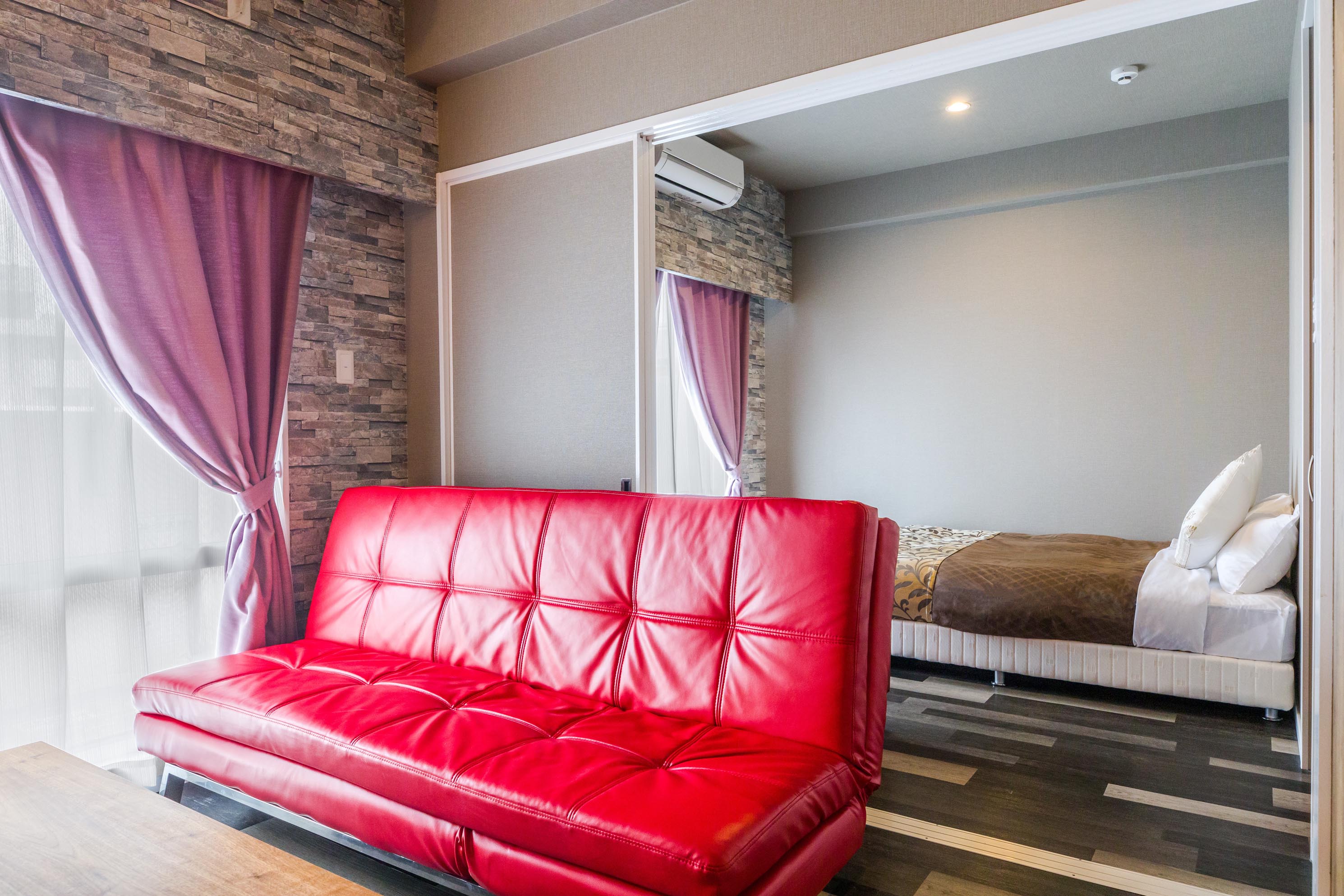 HOTEL KINJO 北谷アラハビーチ美浜 583 最上階オーシャンビューデラックスツイン【32平米】 リビング・寝 rooms
